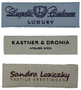 Übersicht unterschiedlicher Webetiketten aus Österreich. Overview of different woven labels from Austria.